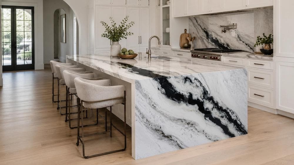 Modern kitchen with a custom island, pendant lighting, and functional layout designed for everyday living.